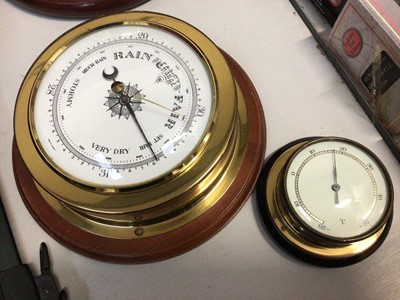 Lot 310 - Sestrel ship's bulkhead clock by Henry Browne & Son Ltd, similar style brass barometer, one other and a cased contemporary telescope, compass and magnifying glass set