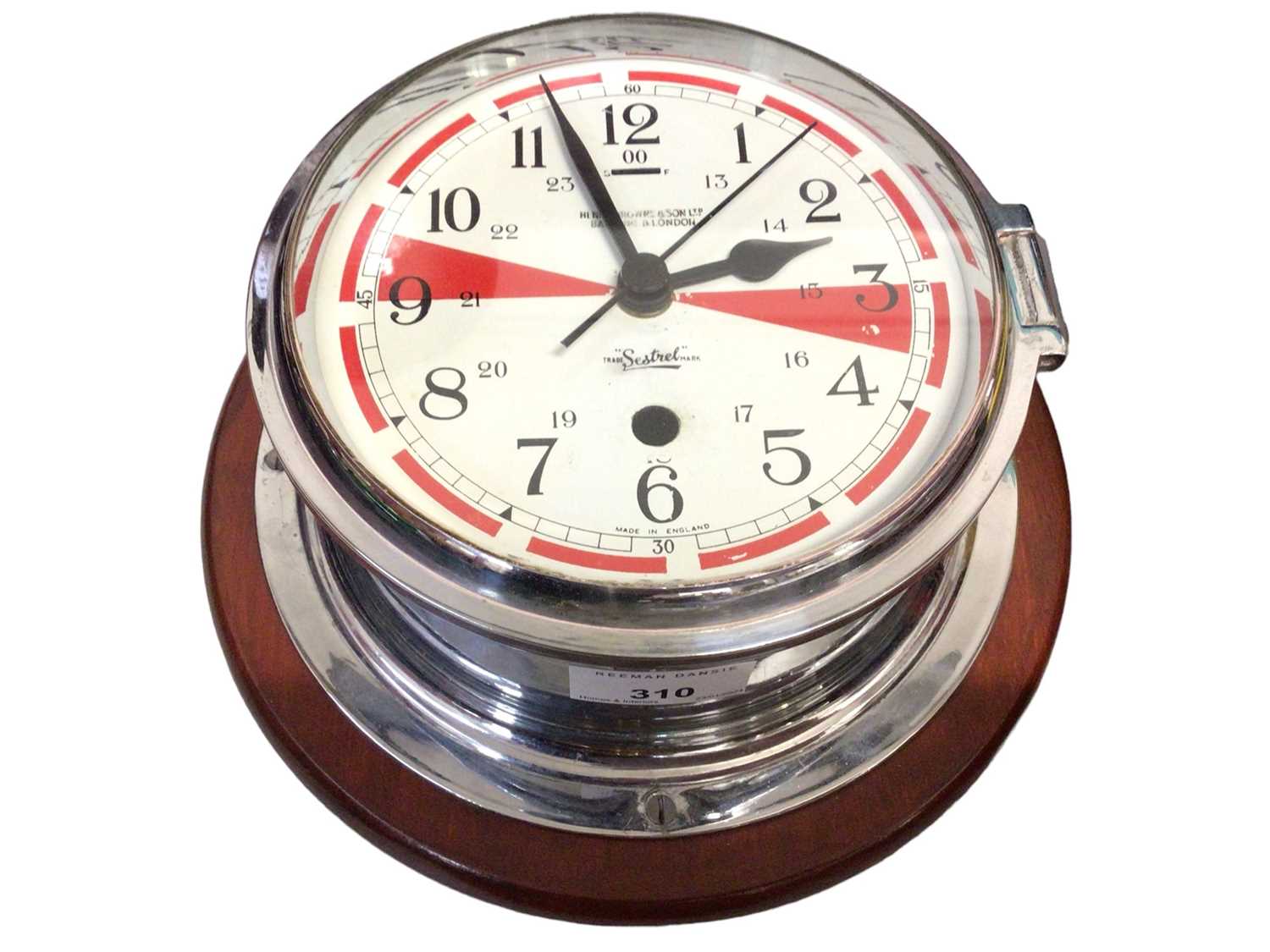 Sestrel Clock Lot 310 - Sestrel ship's bulkhead clock by Henry