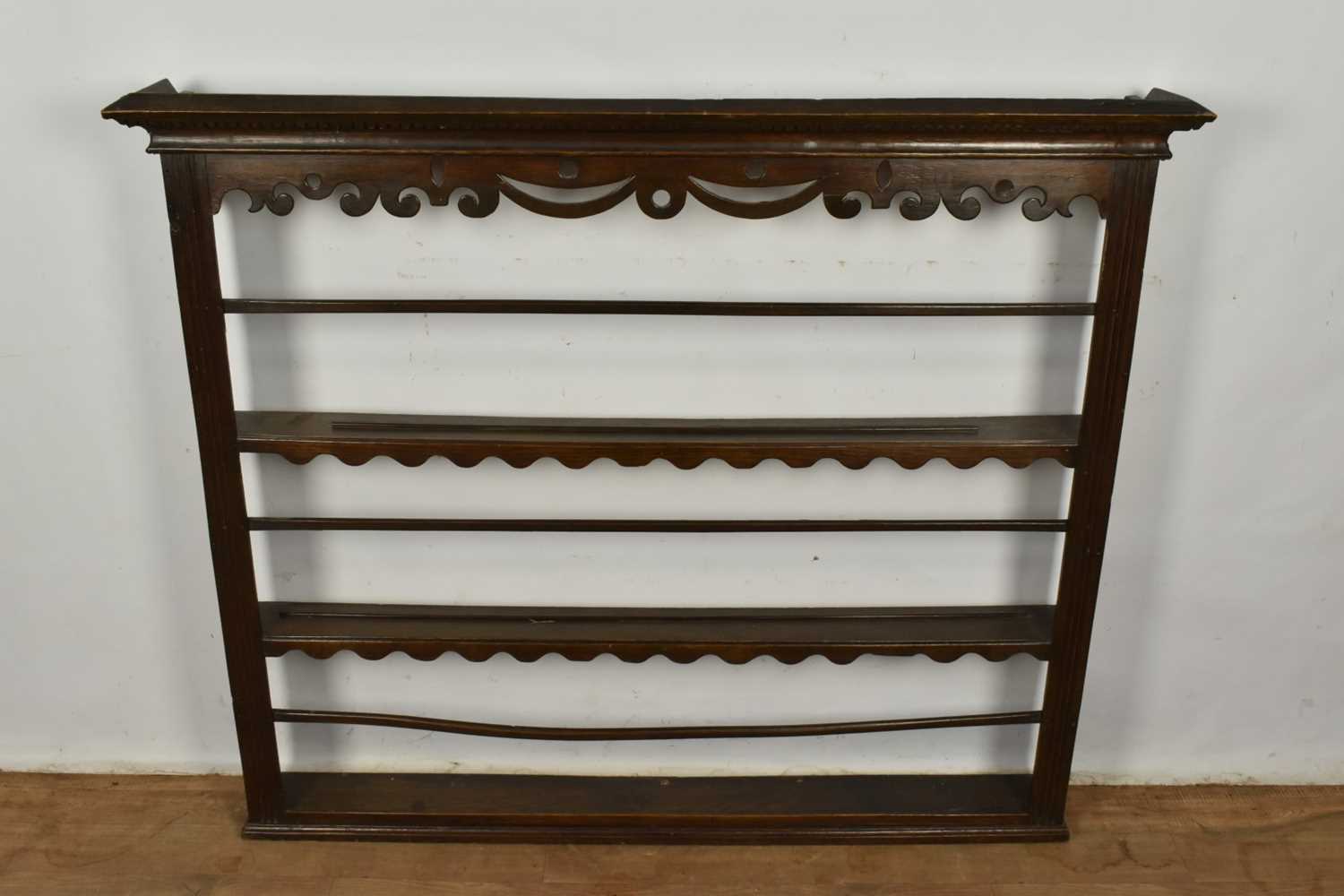 Lot 1321 - 18th century oak plate rack with pierced