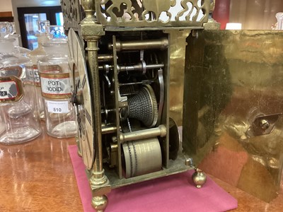 Lot 750 - Victorian 17th century style brass lantern clock signed James Worthington, key and pendulum present.