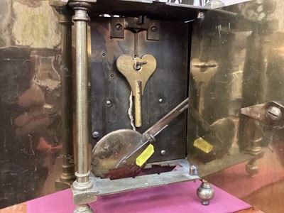 Lot 750 - Victorian 17th century style brass lantern clock signed James Worthington, key and pendulum present.