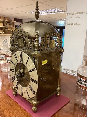 Lot 750 - Victorian 17th century style brass lantern clock signed James Worthington, key and pendulum present.