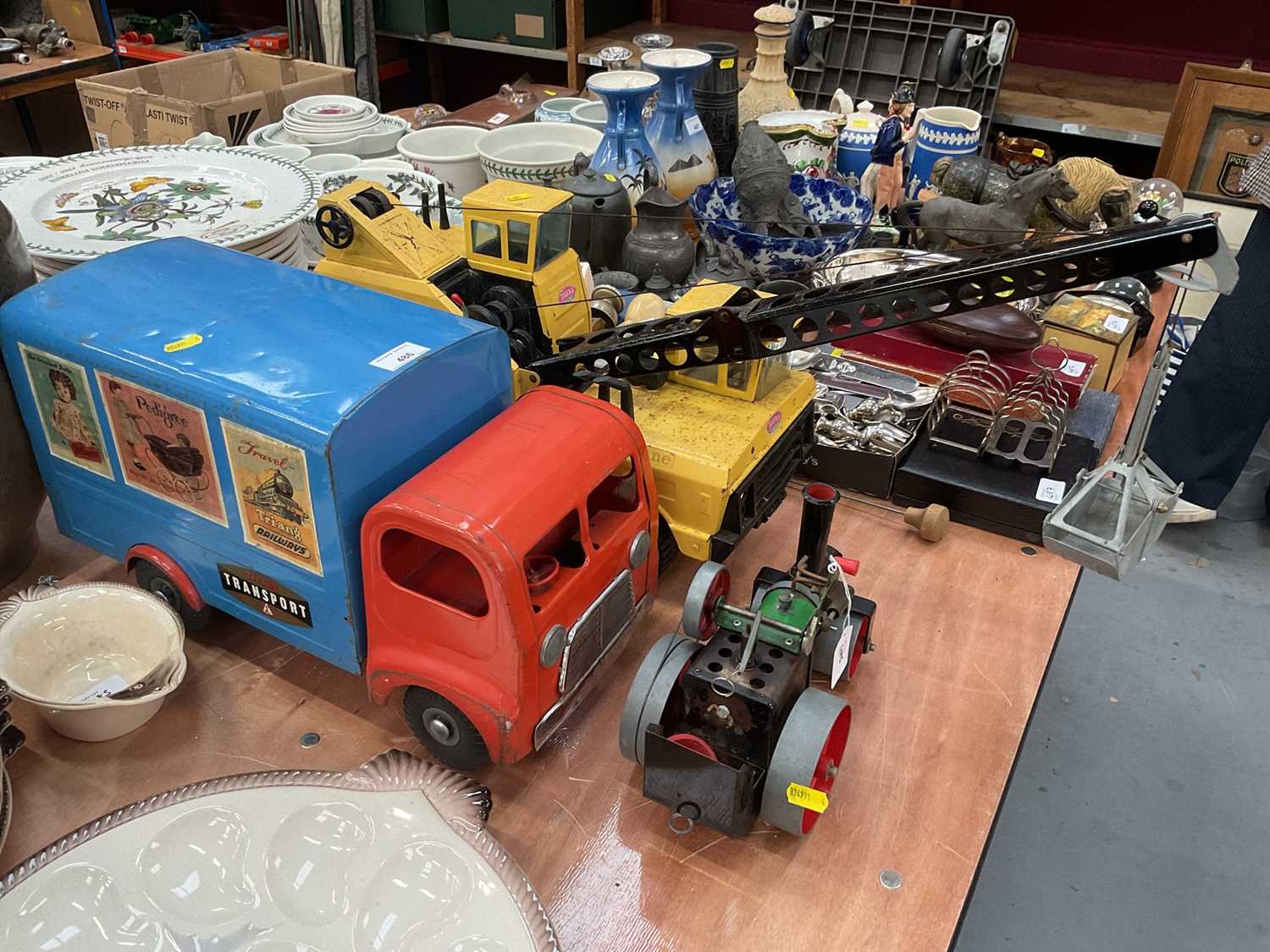 Lot 486 - Tonka crane, Tri-ang transport tin plate truck and a Mamod live steam roller (3)