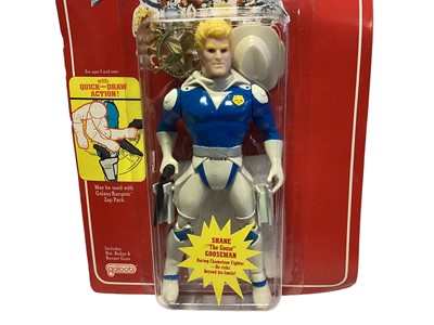 Lot 95 - Galoob (c1986) Adventures of the Galaxy Rangers Shane "The Goose" Gooseman (Galaxy Ranger) 7" action figure with quick draw action (not tested), one gun only, on card (slight crease to hanger part)...