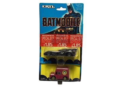 Lot 66 - ERTL DC Comics (c1989) Batman diecast vehicles Batwing no.2495, Joker Van no.2494, Batmobile No.1064 & Joker Van No.152 (taped together with Woolworths Special Buy) and Wristracer No.702, all on ca...