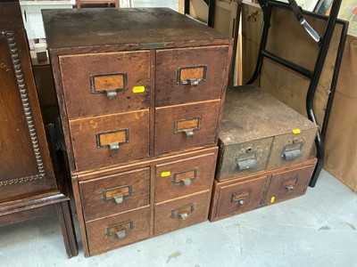 Lot 475 - Three Edwardian oak nests of filing drawers and one metal set of drawers