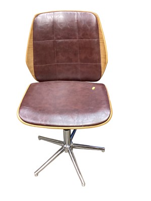 Lot 1301 - Interesting single chair in 'Eames' style upholstered in brown hide