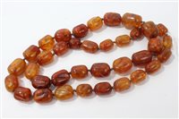 Lot 3292 - Amber graduated bead necklace with...