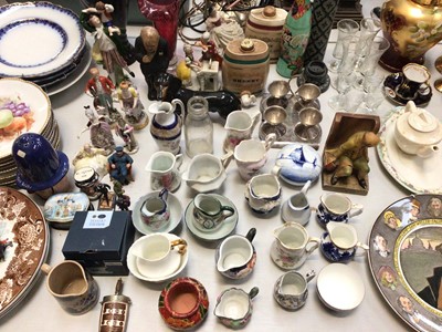 Lot 320 - Group of decorative ceramics and glass including Continental figures, novelty Dracula teapot, various cream/milk jugs and a silver plated egg cup set