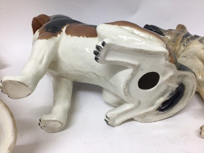 Lot 321 - Four Beswick fireside dog ornaments - Alsation 2410, Golden Labrador 2314, Old English Sheepdog 2232 and Beagle (no number)