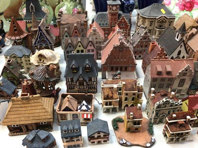 Lot 324 - Large collection of pottery house ornaments/ tea light holders, mostly stamped 'Riga' to base