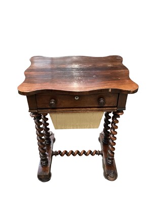 Lot 1212 - 19th century rosewood work table with shaped top, single drawer and needlework well below on twin spiral twist supports, 53cm wide, 40cm deep, 71cm high