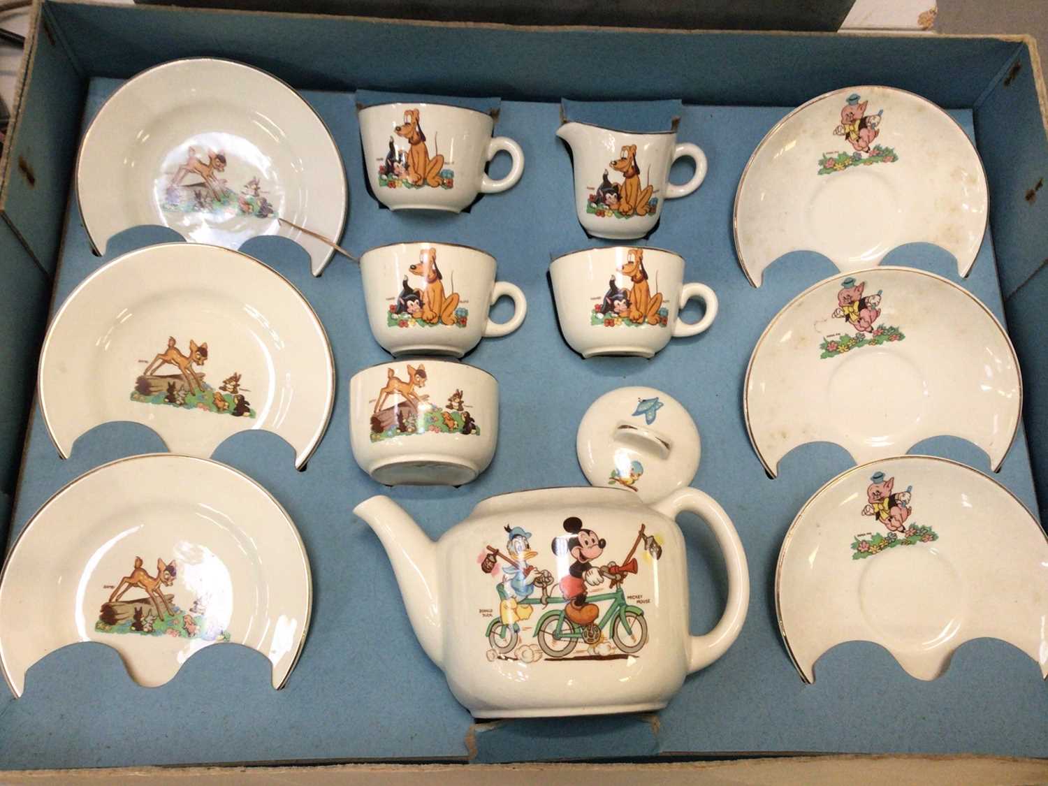 Lot 340 - Disneyland nursery tea set in orginal box, Noddy ceramic child's tea set, Wade figures to include Noddy, Tom & Jerry etc and some dolls house accessories