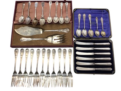 Lot 1060 - Continental silver (800) cutlery, set of six silver handled butter knives in fitted case and some plated flatware