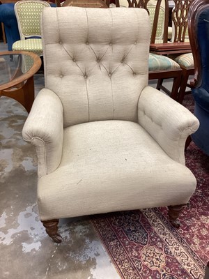 Lot 1219 - Victorian armchair with buttoned cream upholstery on turned front legs