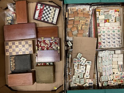 Lot 147 - Two boxes of mahjong tiles, chess sets and related