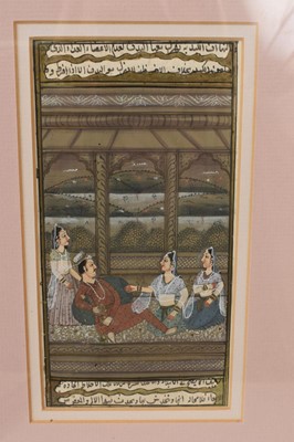 Lot 928 - Four antique Indo-Persian illuminated manuscript leaves, painted in gouache with figural scenes, all in confirming glazed gilt splash frames, total size 34 x 27cm