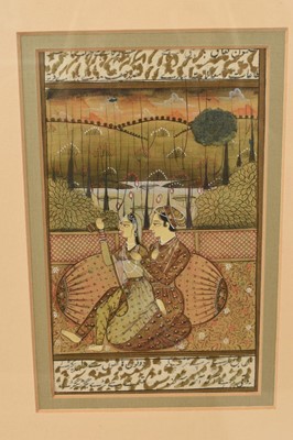 Lot 928 - Four antique Indo-Persian illuminated manuscript leaves, painted in gouache with figural scenes, all in confirming glazed gilt splash frames, total size 34 x 27cm