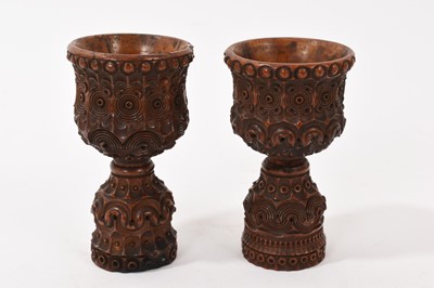 Lot 119 - Pair of carved wood small cups