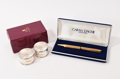 Lot 932 - Cased waterman pen and a pair of silver napkin rings by Asprey