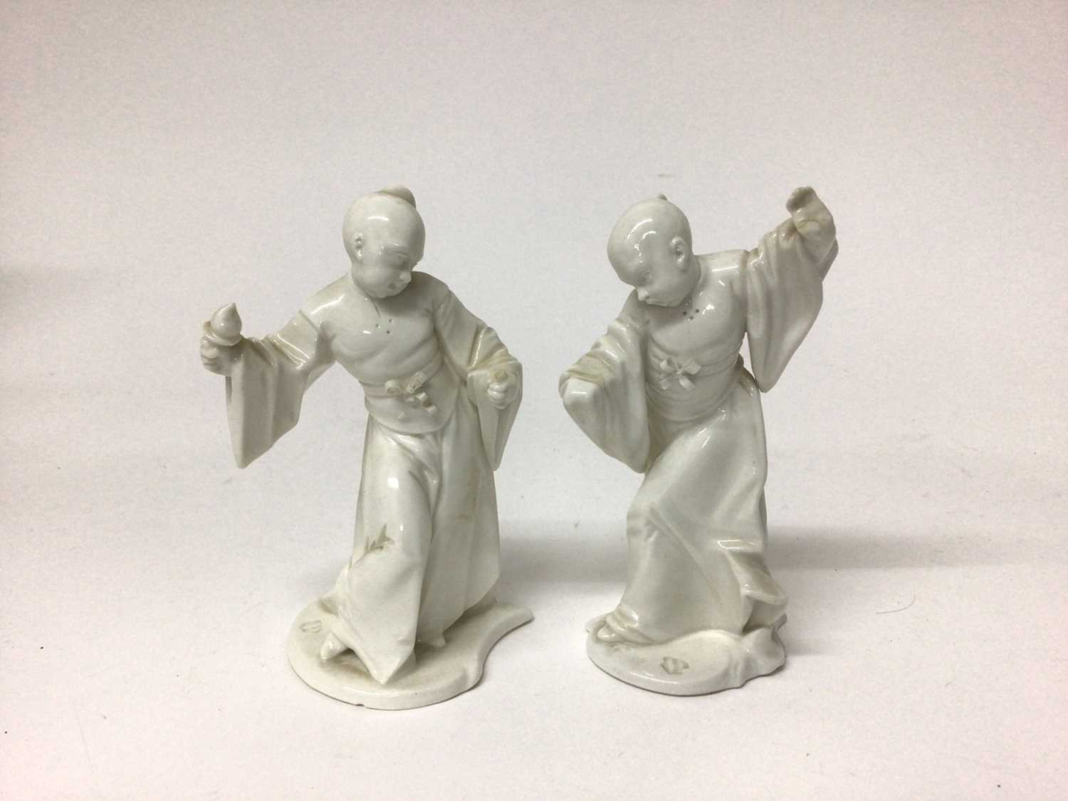 Lot 91 - Pair of Nymphenburg figures of Chinese man and woman, in the white