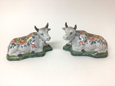 Lot 106 - Pair of Dutch Delft models of recumbent cows