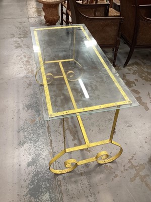 Lot 1520 - 19th century wrought iron table, painted yellow with replacement strengthened glass top, 4.2ft long x 1.10ft deep.