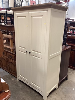 Lot 1255 - Contemporary cream double wardrobe, 114cm wide, 59cm deep, 196cm high