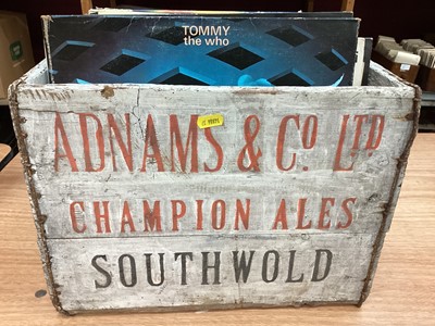 Lot 2235 - Adnams beer crate, c1950s, painted white with ‘Adnams and Co Ltd Champion Ales’ in red, and ‘Southwold’ in black on the front, and the same, with the colour reversed, on the back.  Gold urn decorat...