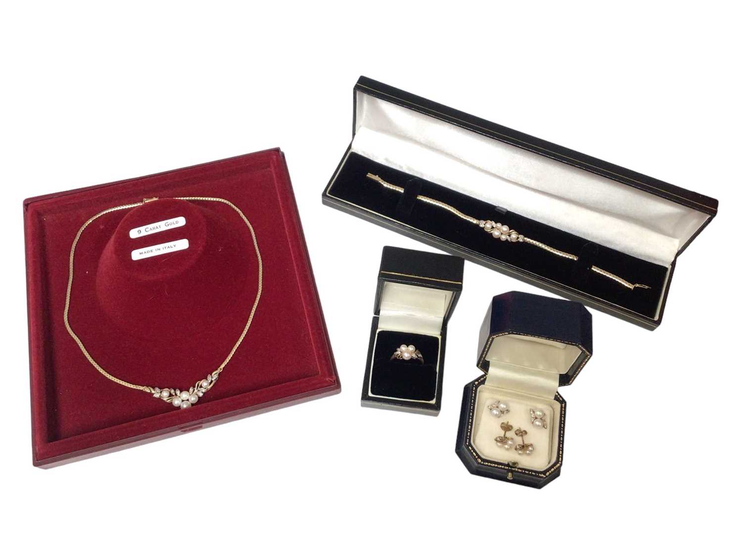 Lot 200 - Diamond and cultured pearl suite of jewellery in 9ct gold setting