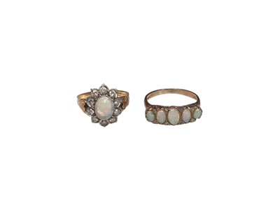 Lot 205 - Opal and diamond cluster ring on gold shank (presumably 18ct gold) and opal five stone ring with diamond accents in 9ct gold setting (2)