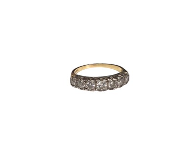 Lot 206 - Diamond eternity ring with seven brilliant cut diamonds in claw setting on 18ct gold shank, estimated total diamond weight approximately 0.60cts.