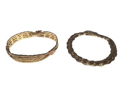 Lot 211 - 9ct gold articulated bracelet and another 9ct gold woven link bracelet (2)