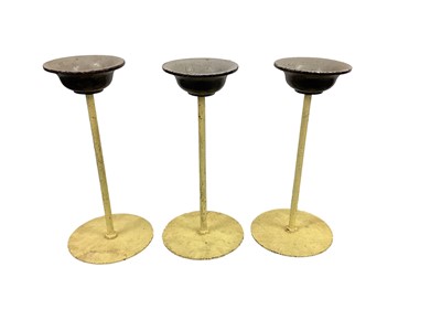 Lot 1552 - Set of three painted metal window display stands