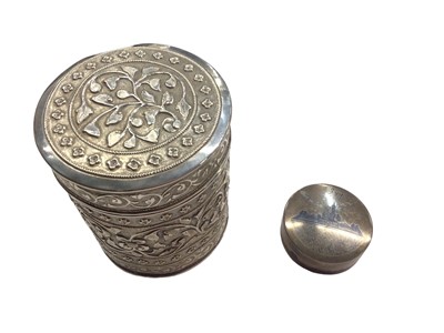 Lot 1048 - Eastern white metal pot and cover with floral scroll decoration and Iraqi white metal Neillo pill box (2)