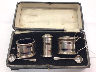 Lot 1076 - Silver three piece cruet set in fitted case