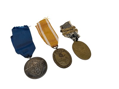 Lot 737 - Nazi Police Long Service Award, Nazi German Defences Medal and another German medal (3).
