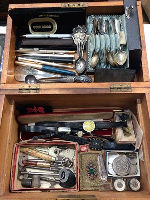 Lot 1052 - Wooden work box containing vintage wristwatches, keys, coins, white metal spoons, pens including Waterman, Parker etc and other sundry items