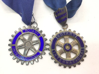 Lot 1055 - Two silver and enamel Rotary International medallions on ribbon, Rotary International gilt metal pin and a Masonic apron