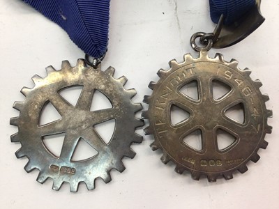 Lot 1055 - Two silver and enamel Rotary International medallions on ribbon, Rotary International gilt metal pin and a Masonic apron