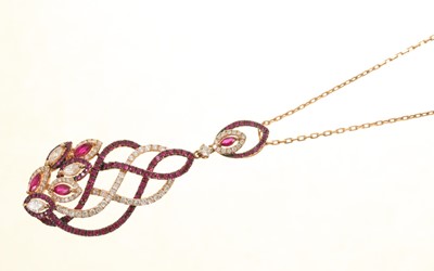 Lot 655 - 18ct gold ruby and diamond pendant necklace