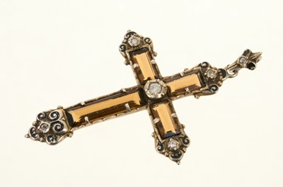 Lot 592 - Diamond and smokey quartz cross pendant in silver mount