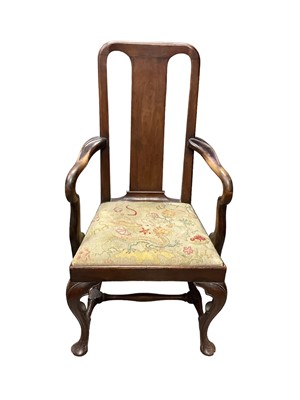 Lot 1319 - Antique elbow chair with splat back, drop in tapestry seat on cabriole front legs joined by stretchers