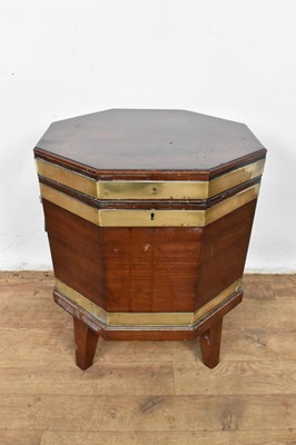 Lot 1313 - George III mahogany and brass bound octagonal cellarette