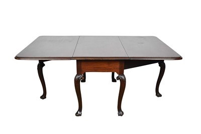 Lot 1307 - George II Cuban mahogany drop-leaf dining table