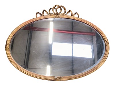 Lot 1426 - Louis XVI style oval giltwood and gesso wall mirror