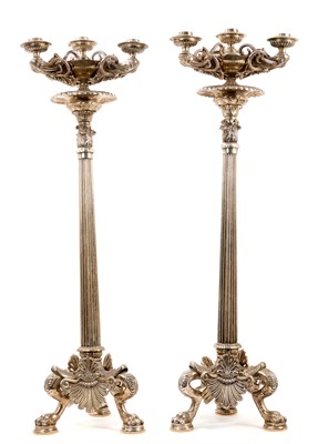 Lot 972 - Impressive pair of silvered Regency style large candlesticks