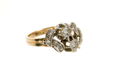 Lot 523 - Diamond two stone ring with diamond set ribbon shoulders on 14ct yellow gold shank