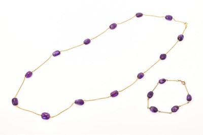 Lot 526 - 18ct gold and amethyst bead necklace and a similar 8ct gold bar link and amethyst bracelet (2)