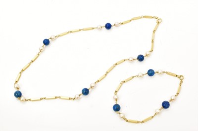 Lot 527 - 14ct gold bar link chain interspaced with cultured pearls and lapis lazuli beads necklace and a matching bracelet